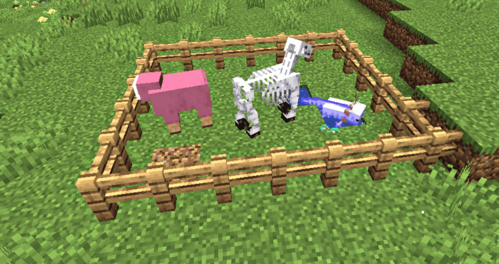 A pink sheep, a skeleton horse, and a blue axolotl